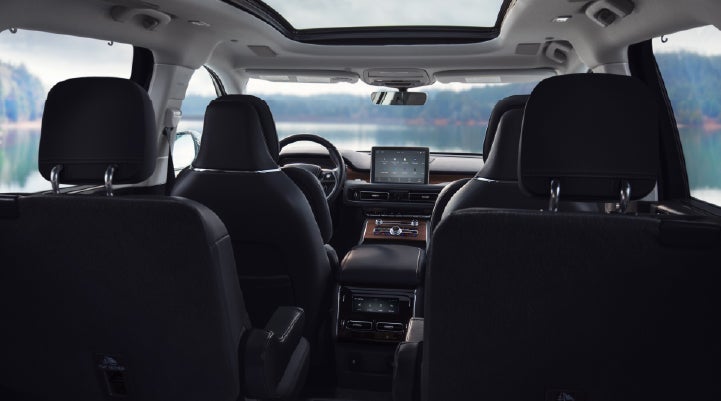 The interior of a 2024 Lincoln Aviator® SUV from behind the second row | Parkway Lincoln in Dover OH