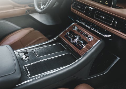 The front center console of a 2024 Lincoln Aviator® SUV is shown | Parkway Lincoln in Dover OH