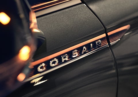 The stylish chrome badge reading “CORSAIR” is shown on the exterior of the vehicle. | Parkway Lincoln in Dover OH